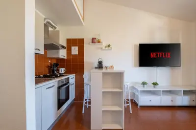 Cucina o angolo cottura di Suite Capitana Harbor-Self Checkin-Terrace-Netflix