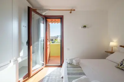 Letto o letti in una camera di Suite Capitana Harbor-Self Checkin-Terrace-Netflix
