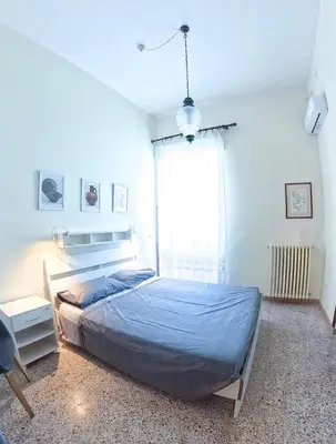 Letto o letti in una camera di Appartamento Cappuccini