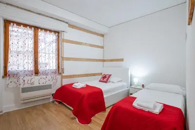 Letto o letti in una camera di 5 minuti dal mare e Parco naturale- casa moderna con veranda