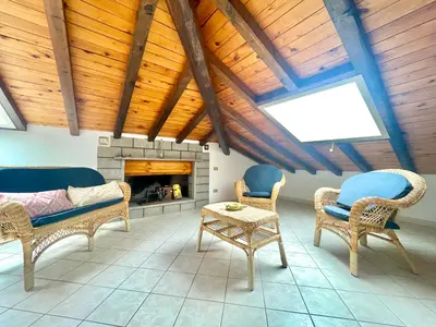 Area soggiorno di Blue Zone Tiny Penthouse