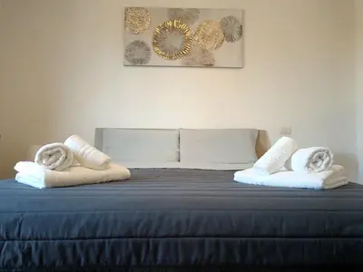 Letto o letti in una camera di Poetto Parkside Apartment