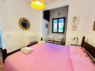 Letto o letti in una camera di Villa Mariella Costa Rei