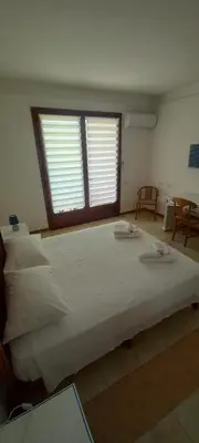 Letto o letti in una camera di Domu Kokoro