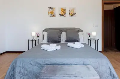 Letto o letti in una camera di Hesa House