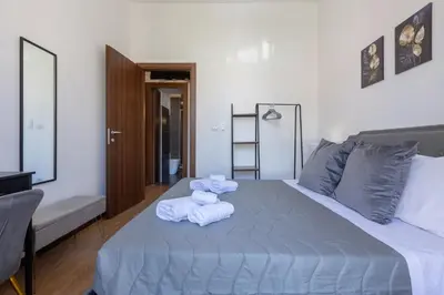 Letto o letti in una camera di Hesa House