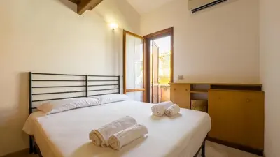Letto o letti in una camera di Frontemare Apartment-Funtana Meiga