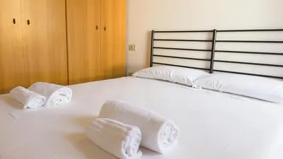 Letto o letti in una camera di Frontemare Apartment-Funtana Meiga