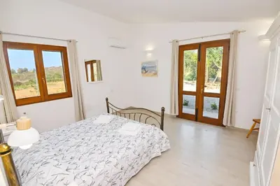 Letto o letti in una camera di Villa della Monica Pure relax