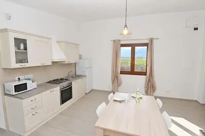 Cucina o angolo cottura di Villa della Monica Pure relax