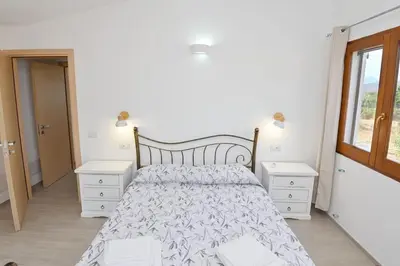 Letto o letti in una camera di Villa della Monica Pure relax