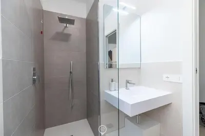 Bagno di White Magnolia Apt