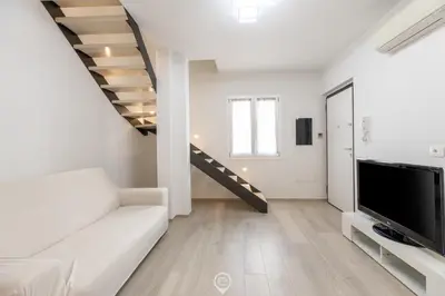 TV o dispositivi per l'intrattenimento presso White Magnolia Apt