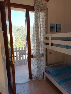 Letto o letti in una camera di Casetta Anna y nietos