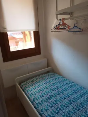 Letto o letti in una camera di Casetta Anna y nietos