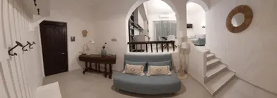 Area soggiorno di casa Evelyn Capo Blu