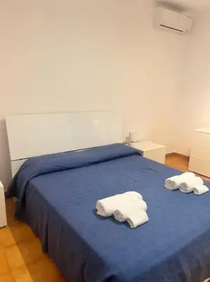 Letto o letti in una camera di Casa degli ulivi