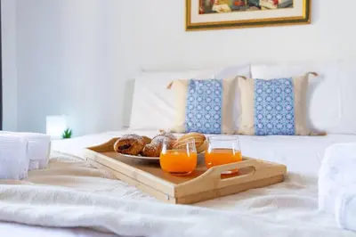 Letto o letti in una camera di Appartamento Confortevole, Wi-Fi & Colazione Free