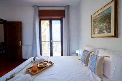 Letto o letti in una camera di Appartamento Confortevole, Wi-Fi & Colazione Free