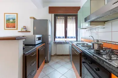 Cucina o angolo cottura di Appartamento Confortevole, Wi-Fi & Colazione Free