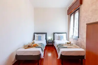 Letto o letti in una camera di Appartamento Confortevole, Wi-Fi & Colazione Free