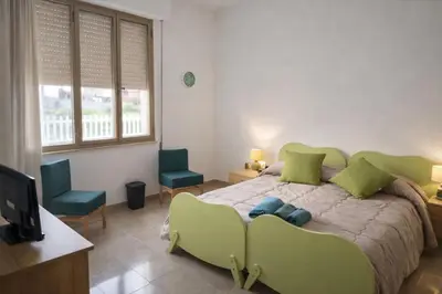 Letto o letti in una camera di Casa Cera Arras