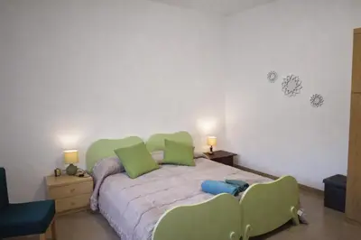 Letto o letti in una camera di Casa Cera Arras