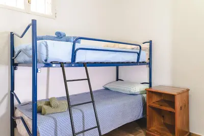 Letto o letti in una camera di Casa Costa degli Angeli
