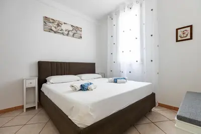 Letto o letti in una camera di Sweet House