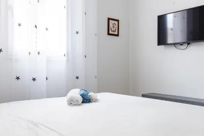 Letto o letti in una camera di Sweet House