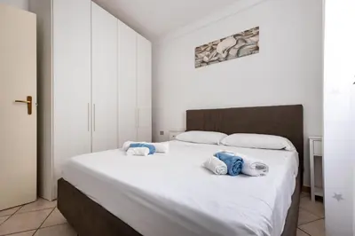 Letto o letti in una camera di Sweet House