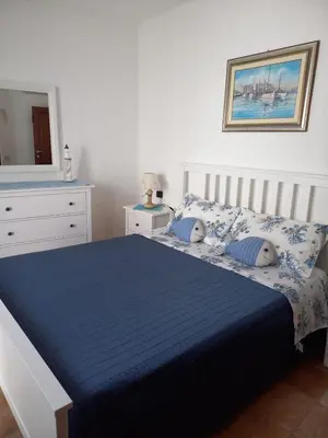 Letto o letti in una camera di Villa Erika 25 mt dalla Spiaggia