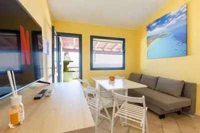 TV o dispositivi per l'intrattenimento presso Incantevole Vista Mare, 450mt Spiaggia Kal'e Moru