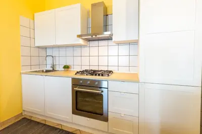 Cucina o angolo cottura di Incantevole Vista Mare, 450mt Spiaggia Kal'e Moru