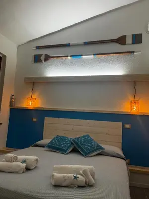Letto o letti in una camera di Attico aMare Costa Rei - 100m dalla spiaggia