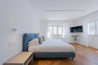 Letto o letti in una camera di Mamas