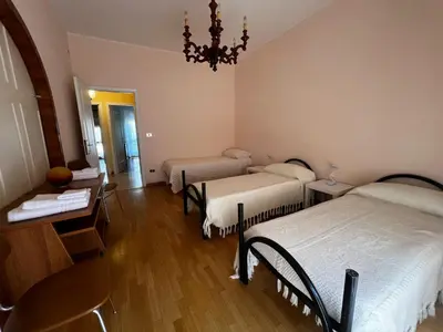 Letto o letti in una camera di Casa Dani