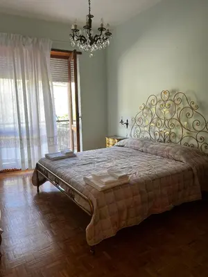 Letto o letti in una camera di Casa Dani