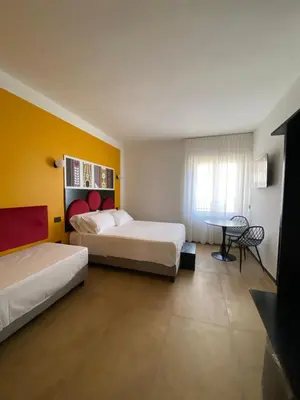 Letto o letti in una camera di Casa eFFe