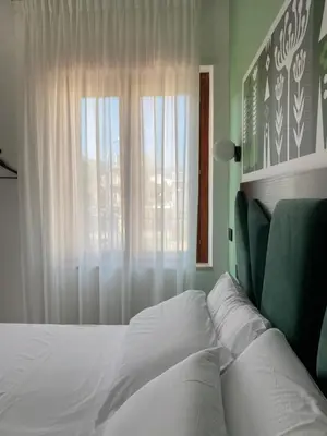 Letto o letti in una camera di Casa eFFe