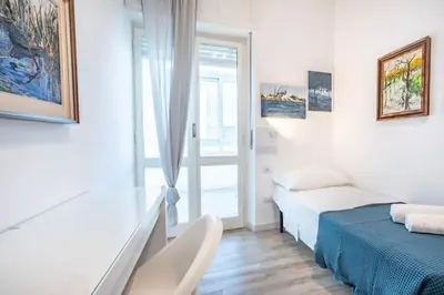 Letto o letti in una camera di Flamingo Poetto mare a due passi