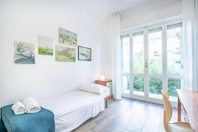 Letto o letti in una camera di Flamingo Poetto mare a due passi