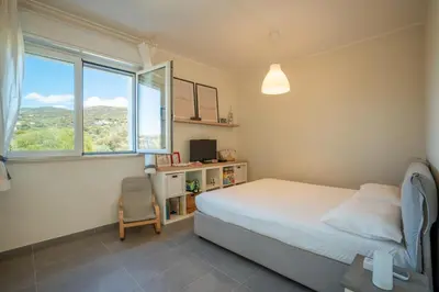 Letto o letti in una camera di Villa dei Mori