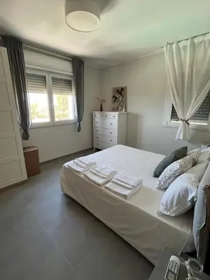 Letto o letti in una camera di Villa dei Mori