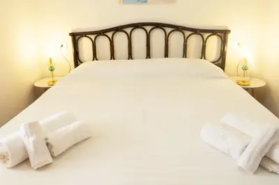 Letto o letti in una camera di Casa La Magnolia Frontemare