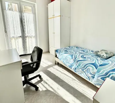 Letto o letti in una camera di Appartamento Visconti