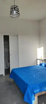 Letto o letti in una camera di B&b S'Erbei Niedda Guesthouse