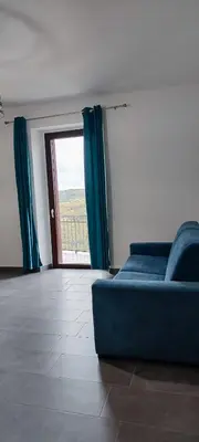 Area soggiorno di B&b S'Erbei Niedda Guesthouse