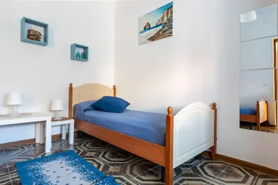 Letto o letti in una camera di Dimora del Pittore, Usellus