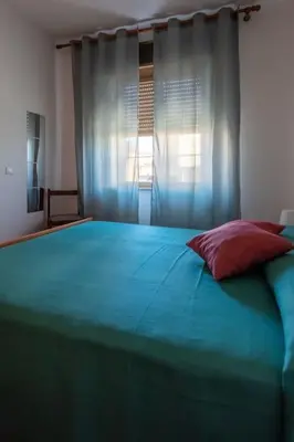 Letto o letti in una camera di Dimora del Pittore, Usellus